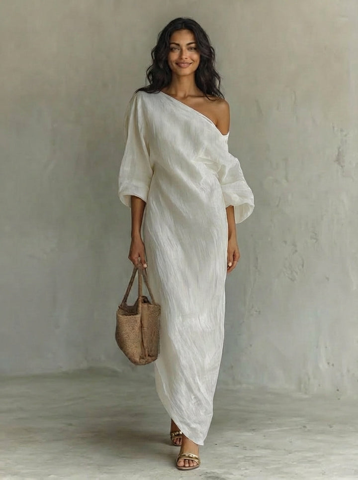Elegante abito svolazzante in cotone-lino bianco avorio con spalle scoperte