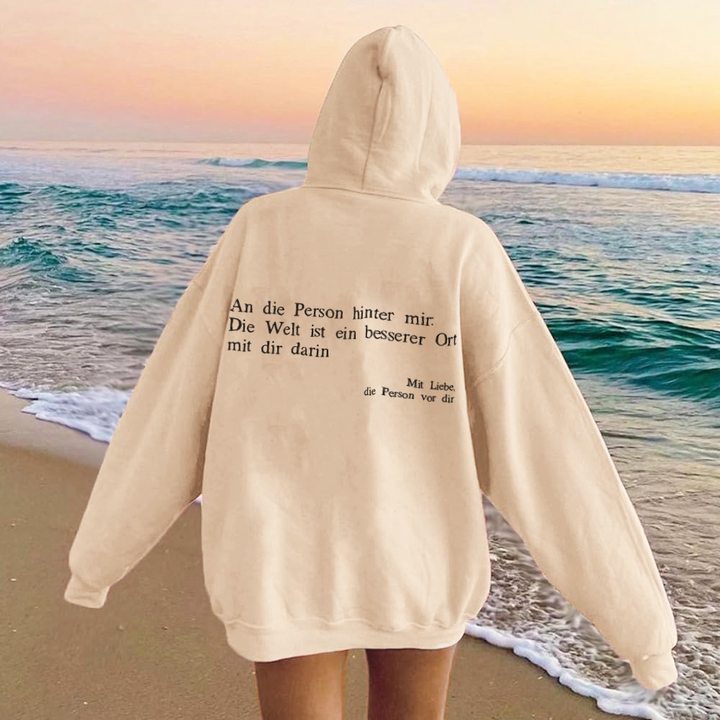Nele | Sweat à capuche avec inscription dans le dos