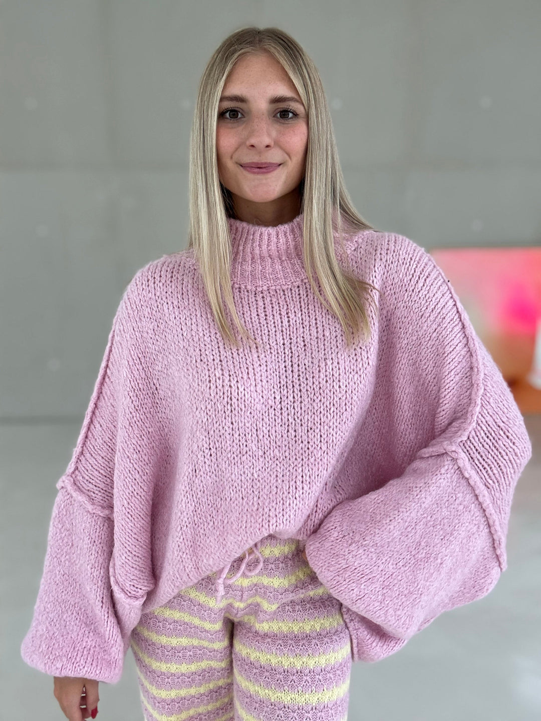 Alex | Maglione a coste con collo alto e maniche a campana
